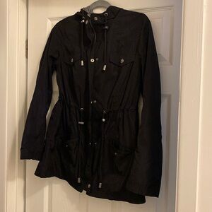 Black rain coat with zipper, buttons, hood and pockets